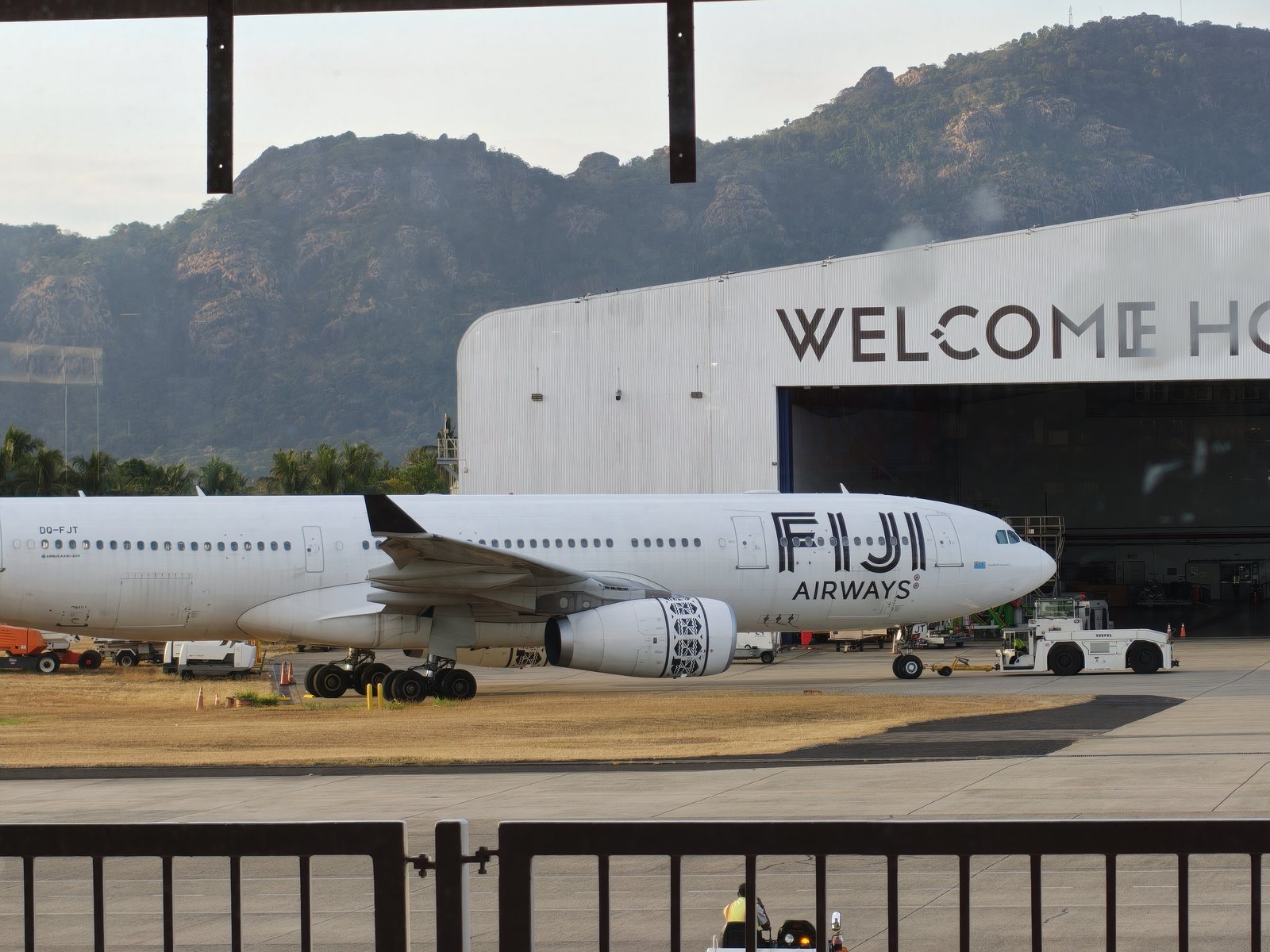 Fiji Airways airliner at a hangar